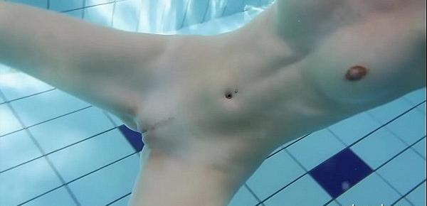  Mia babe swimming naked in the pool